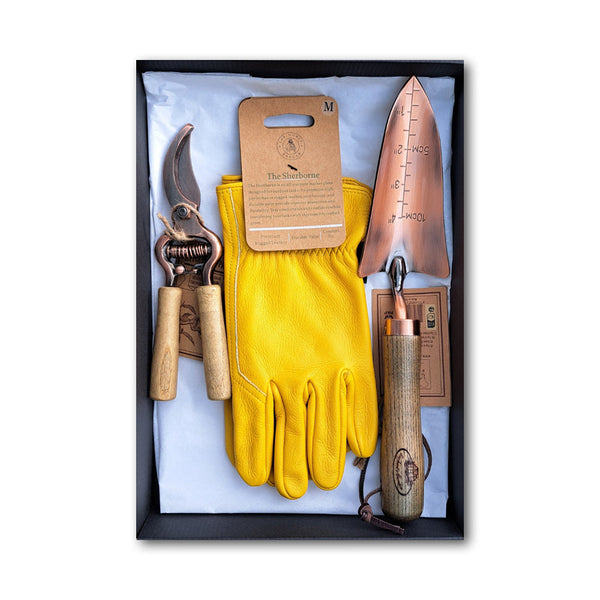 The Sherborne Gift Set offers The Sherborne Gardening Glove along with our Copper Plated Trowel and Pruners making a wonderful gift set encased in our Noble Badger Gift Box.